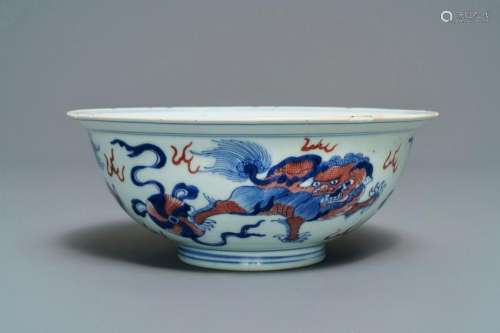 A Chinese blue, white and underglaze red 'Buddhist