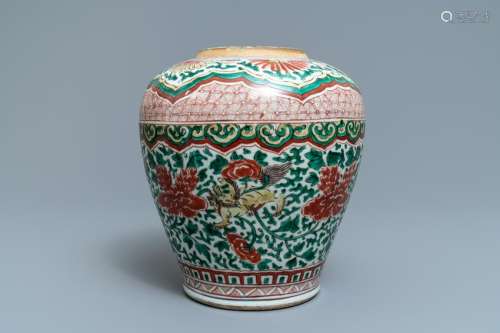 A Chinese wucai vase with buddhist lions and peonies,