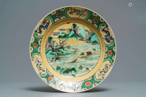 A Chinese famille verte cafÃ©-au-lait ground plate with