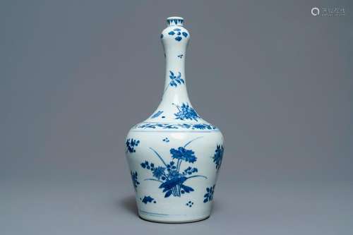 A Chinese blue and white bottle vase with floral