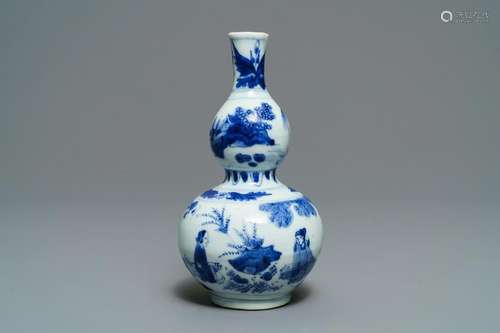 A Chinese blue and white double gourd vase,