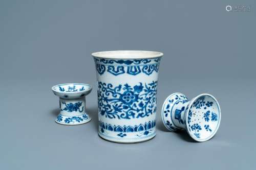 A Chinese blue and white brush pot and a pair of