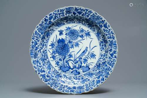 A Chinese blue and white moulded dish with a bird among