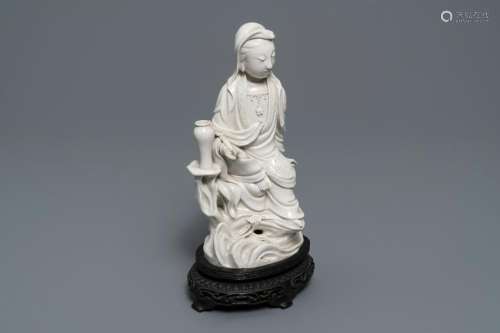 A Chinese Dehua blanc de Chine model of Guanyin, seal