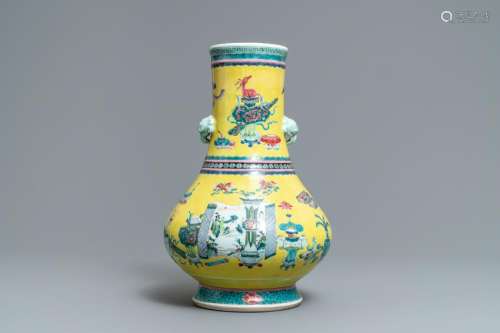 A Chinese yellow ground famille rose bottle vase with