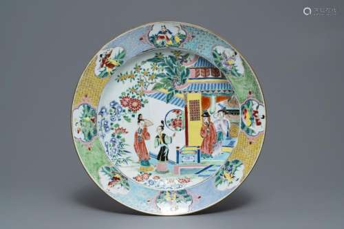A large Chinese famille rose charger with figures in