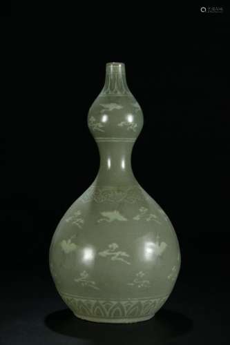 AN OLD KOREAN CELADON GLAZED GOURD VASE