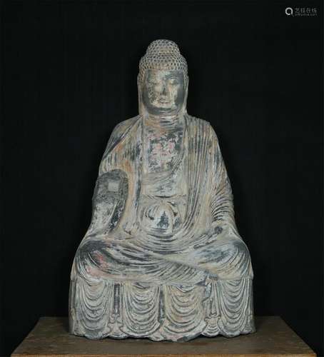 AN OLD LIMESTONE CARVED SAKYAMUNI FIGURE