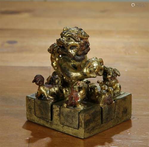 UNUSUAL GILT BRONZE SEAL. LION FINIAL