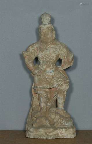 A WHITE MARBLE CARVED WARRIOR FIGURE