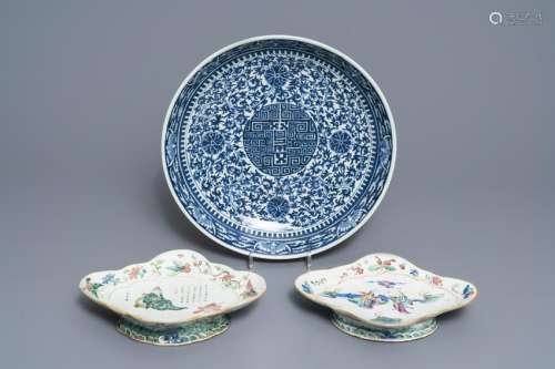 A Chinese blue and white charger and two famille rose