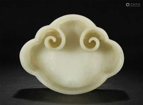 A CELADON JADE CARVED OF A BRUSH WASHER