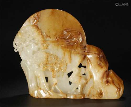 A PALE CELADON AND RUSSET JADE CARVING OF A SPECIMAN