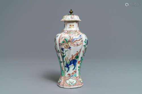 A Chinese famille verte vase and cover with mythical