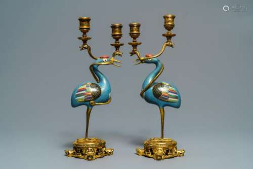 A pair of Chinese cloisonnÃ© gilt bronze candelabra