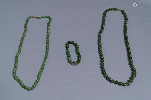 Two Chinese necklaces and a bracelet with spinach green