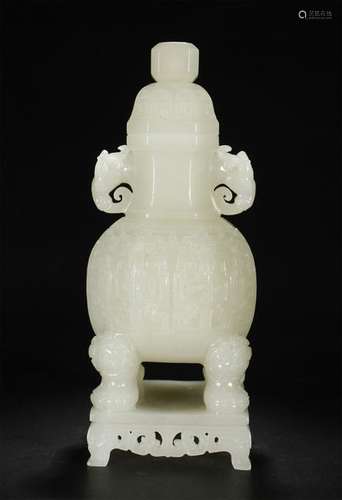 A DETAIL CARVED PALE CELADON JADE VASE W/COVER