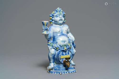 A polychrome Brussels faience 'Bacchus on a wine