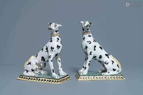 A pair of polychrome Brussels faience models of spotted