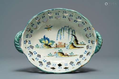 A polychrome Brussels faience 'landscape' basket, 18th