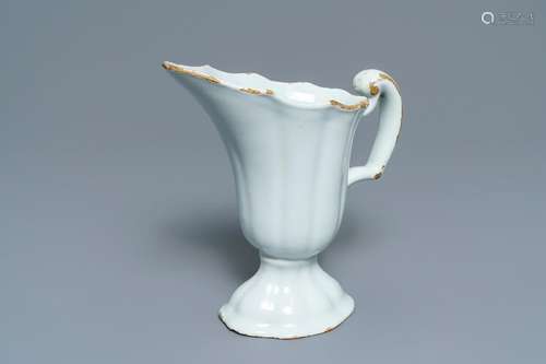 A white Dutch Delft ribbed helmet-shaped jug, 18th C.