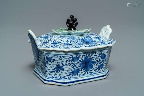 A Dutch Delft blue and white grape-topped butter tub,