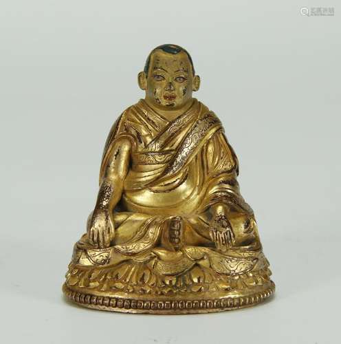 ANTIQUE GILT BRONZE FIGURE OF A GURU