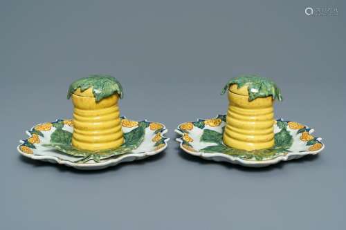 A pair of rare polychrome Dutch Delft honey pots,