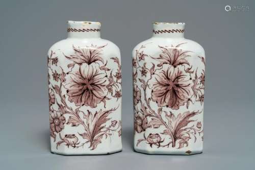 A pair of manganese Dutch Delft tea caddies with floral