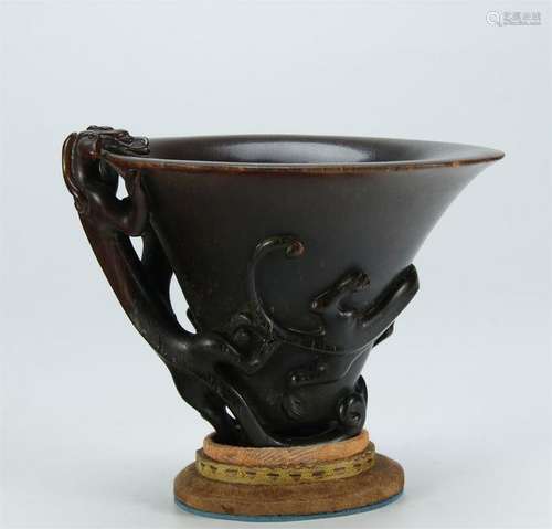 A NICE CARVED HORN LIBATION CUP