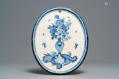 A fine oval Dutch Delft blue and white plaque with a