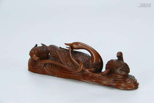 A NICE BOXWOOD CARVED PEN RESTER