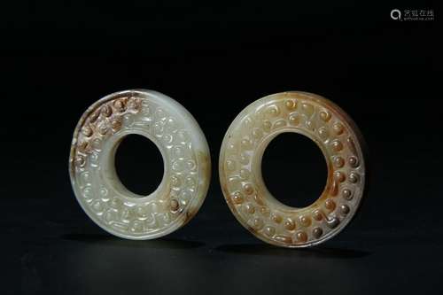 ANTIQUE PAIR PALE CELADON/RUSSET JADE CARVED BI DISK