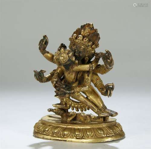 ANTIQUE GILT BRONZE FIGURE OF SIX ARMED MAHAKALA