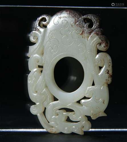 A PALE CELADON/RUSSET JADE CARVED PENDANT