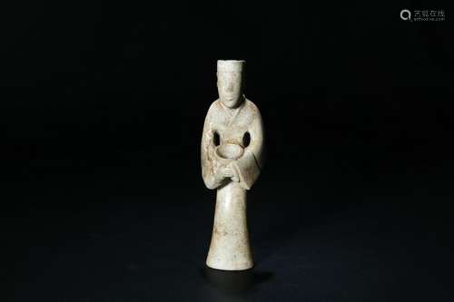 A PALE CELADON JADE CARVED SERVANT FIGURE