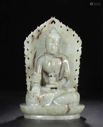 CHINESE CELADON JADE SEATED GUANYIN ON NICHE