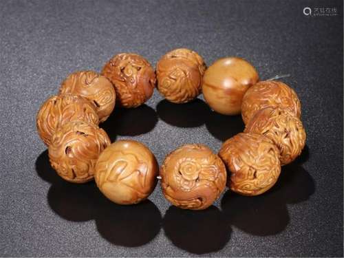 CHINESE WALNUT KERNEL CRAVED BEAD BRACELET