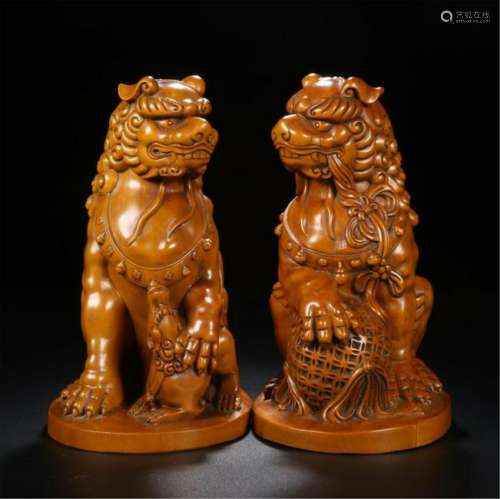 PAIR OF CHINESE BOXWOOD BEAST TABLE ITEM