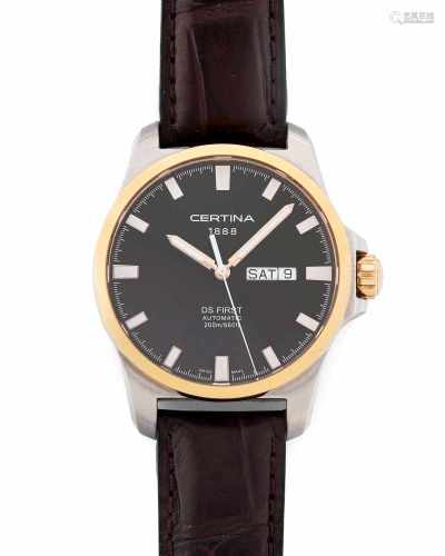 Certina DS FirstRunde, automatische Armbanduhr 90er Jahre in Edelstahlgehäuse mit Gelbgoldlünette.