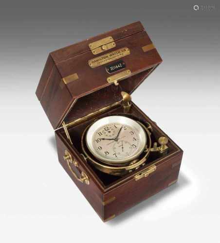 Schiffschronometer, Hamilton USA, um 1900. Braunes Holzgehäuse mit Doppeldeckel und verglaster