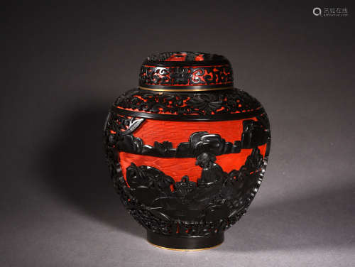 A CARVED CINNABAR LACQUARE JAR AND COVER, 20TH CENTURY