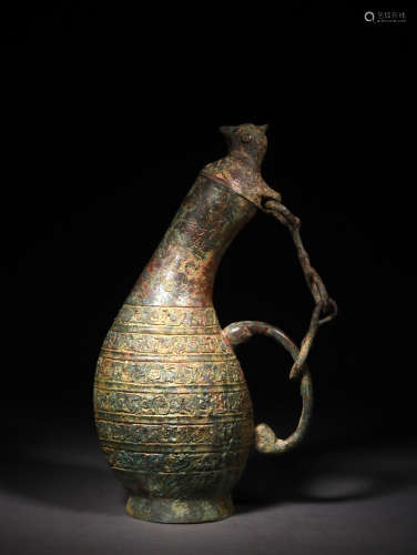 A BRONZE ARCHASTIC FORM EWER