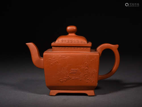 A YIXING-GLAZED LANDSCAPE TEAPOT, 19TH CENTURY