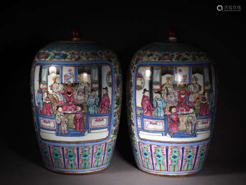 A PAIR OF FAMILLE ROSE JARS AND COVERS, 19TH CENTURY