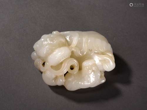 A CREAMY WHITE JADE MYTHICAL BEASTS, 18TH CENTURY