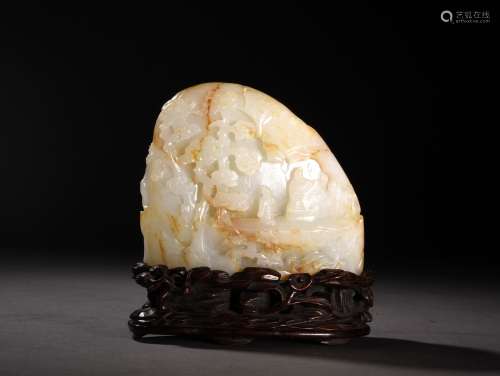 A WHITE AND RUSSET JADE BOULDER, 18TH CENTURY