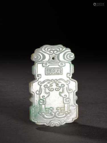 A CARVED JADEITE PLAQUE, 19TH CENTURY