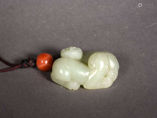 A PALE CELADON JADE DOUBLE BADGER, 18TH CENTURY