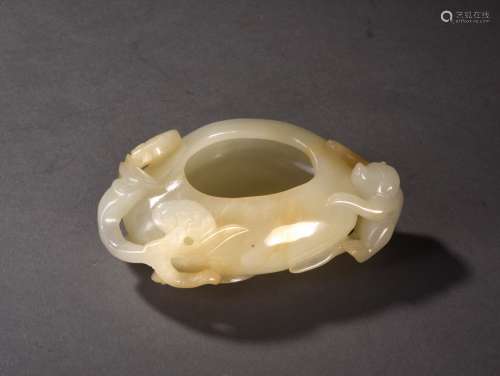 A CREAMY WHITE AND RUSSET JADE WATER CONTAINER, 18TH CENTURY